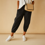 Ademende damesbroek met losse pasvorm in beige, wit, groen, blauw of zwart, ideaal voor werk of vrije tijd tijdens warme dagen.