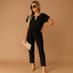 Women’s chic tailored jumpsuit with elegant fit, available in black, pink, khaki, and fuchsia pink. Perfect for business, formal dinners, or evening events.